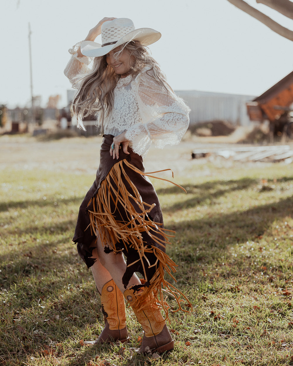 Bronc Rider Brown and Yellow Leather Fringe Skirt.